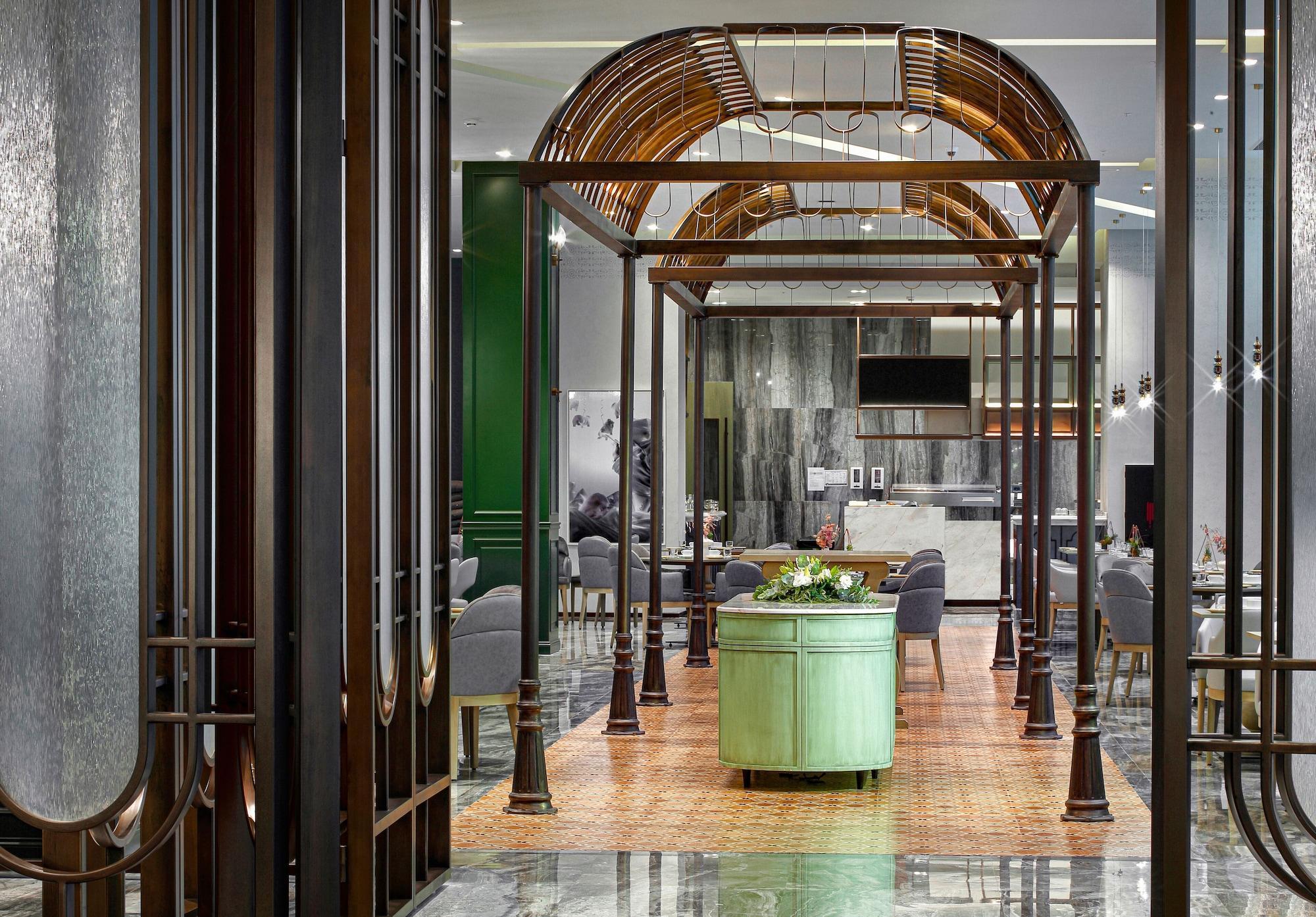 Wanda Vista Istanbul Hotel Luaran gambar The interior of the restaurant